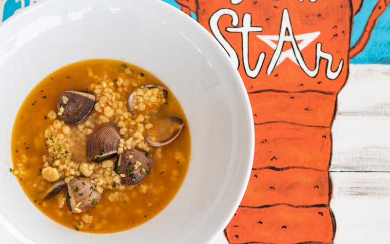 PalmBeach Tropical Restaurant | LobStar Soup | fresh fish broth, clams, and artisan fresh pasta granules