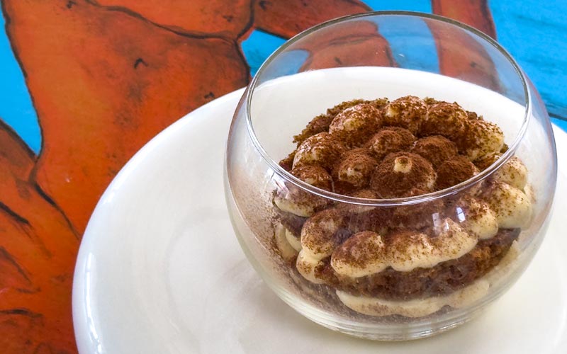 PalmBeach Tropical Restaurant | Chef’s Tiramisu | Savoiardi soaked in coffee, layered with Zabaglione and Mascarpone cream, and dusted with cocoa powder